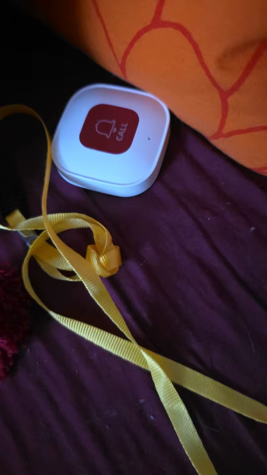 Senior Safe wearable button with lanyard
